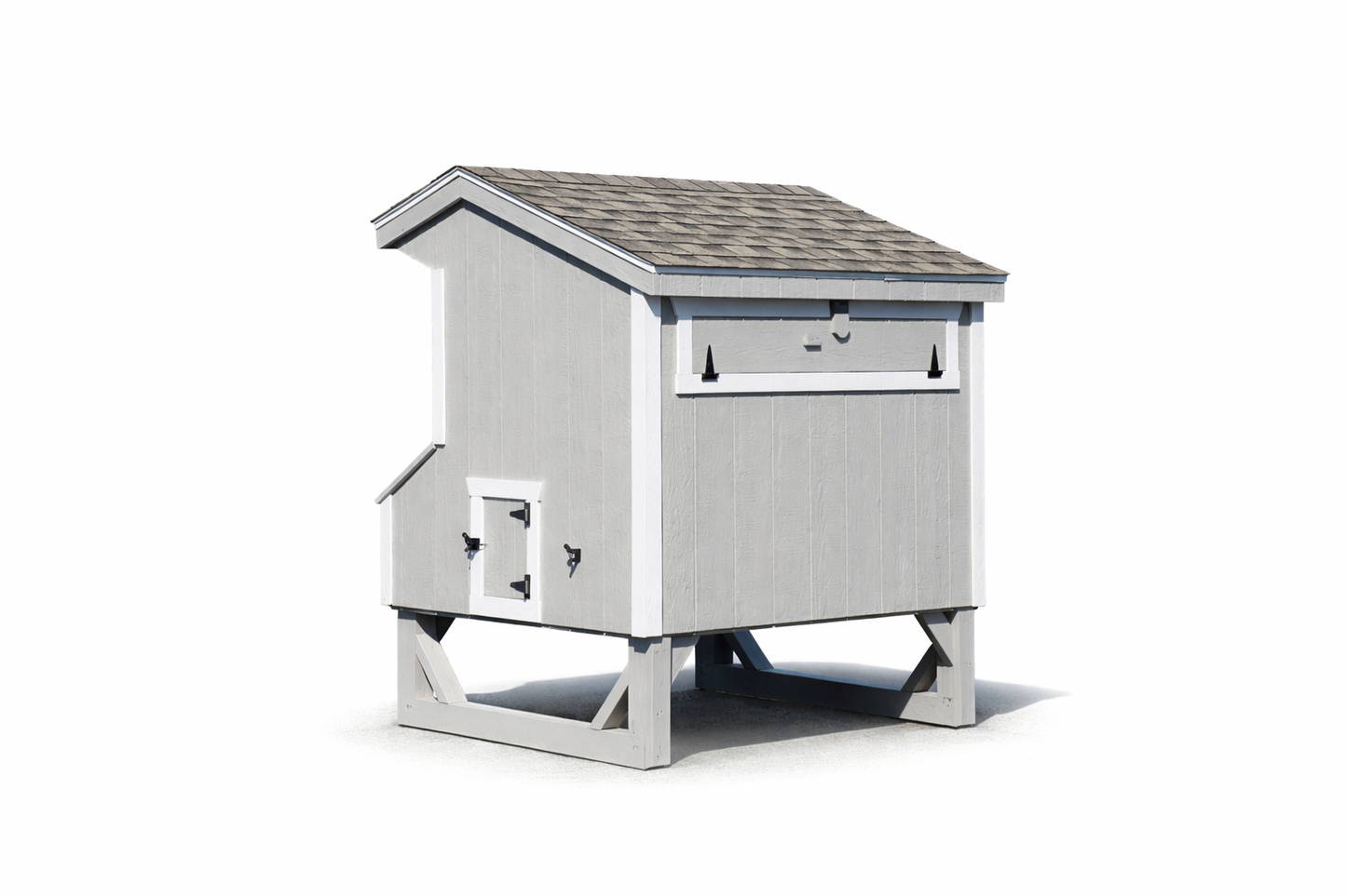 Rear view of a 4x6 Amish-built Quaker chicken coop in white with charcoal trim, highlighting the LP SmartSide siding and durable gabled roofline.