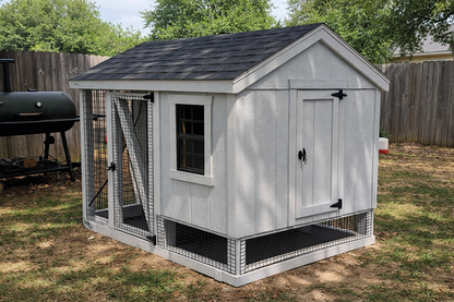 A57C chicken coop with run placed in backyard setting