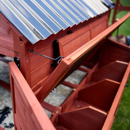 Close-up of Brahma chicken coop nesting box roof section showing flashing detail and weatherproof lid construction