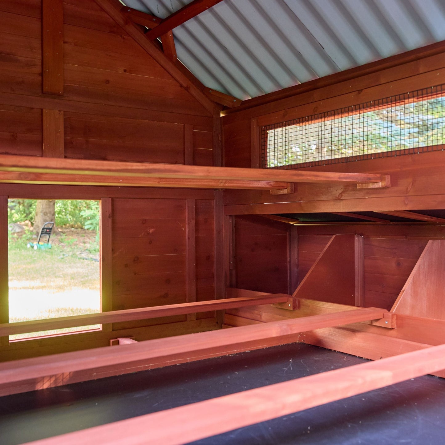 Close-up of Brahma chicken coop nesting box roof section showing flashing detail and weatherproof lid construction