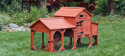 Front angle view of Leghorn Cottage chicken coop for small flocks showing hen house entry door, ramp, and enclosed run exterior