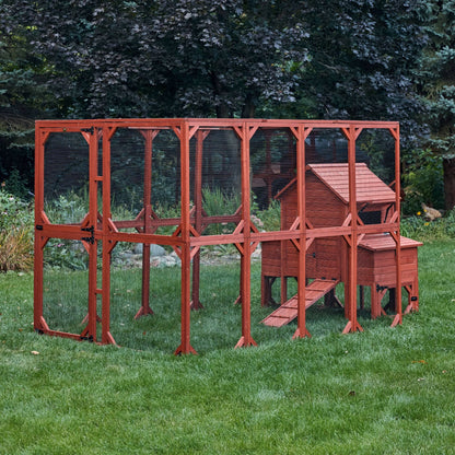 Side view of Orpington Lodge chicken coop and run extension assembled outdoors showing full run length and hen house elevation

