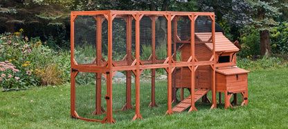 Orpington Lodge chicken coop for 6 chickens fully assembled in a backyard garden setting showing natural wood finish and complete run configuration