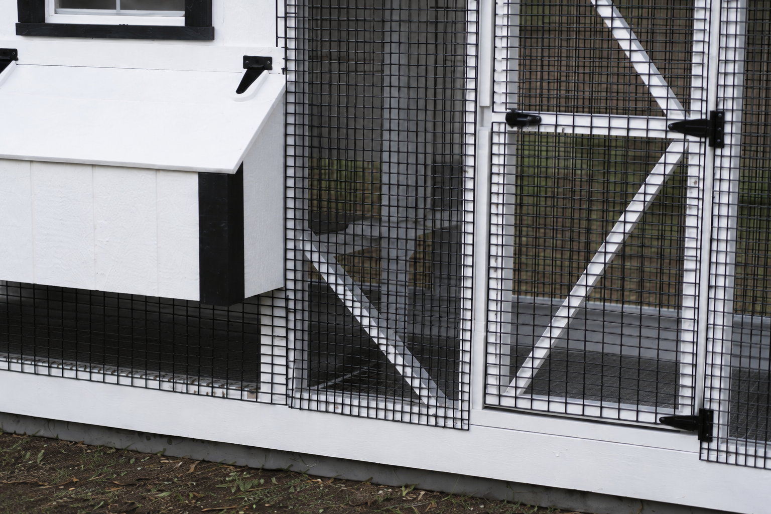 Close-up of predator-proof hardware cloth wire mesh on chicken coop run