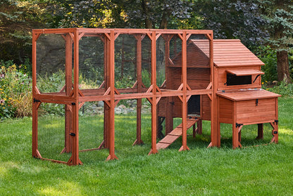 Rhode Island Homestead hen house and run assembled in a backyard garden setting showing natural wood finish and full run enclosure
